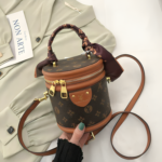 BOLSO CILINDRICO ELEGANTE